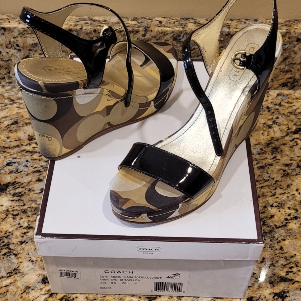 Authentic Coach brand brown patent leather signature wedge sandal.